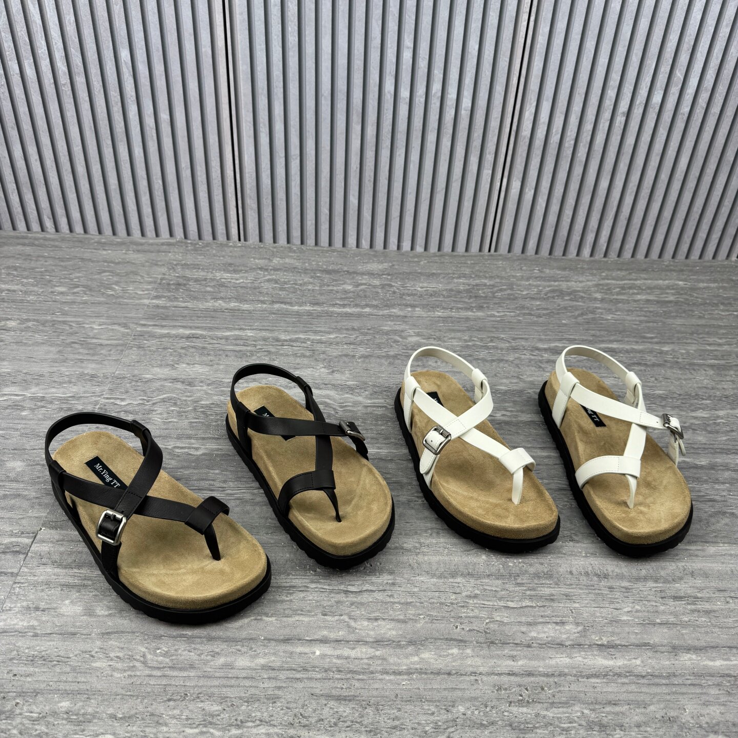 欧洲站欧货真皮罗马凉鞋女2026夏季新款夹趾绑带平底防滑沙滩鞋潮