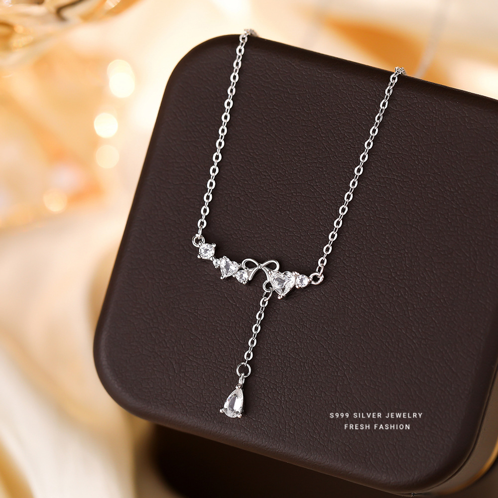 s999纯银蝴蝶结爱心水滴项链女款长流苏小清新托帕石锁骨链感