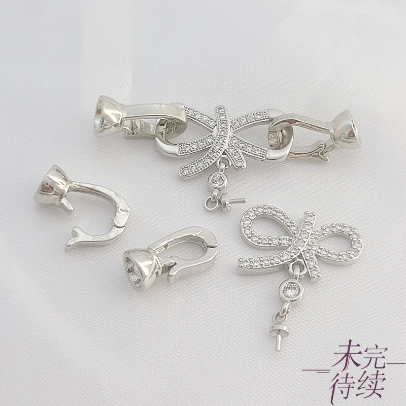 白金色蝴蝶结带羊眼针收尾扣