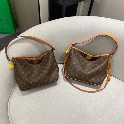 真皮水桶包优草坊老花斜挎轻奢