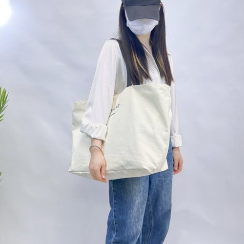 帆布纯色带夹层加厚通勤布包结实