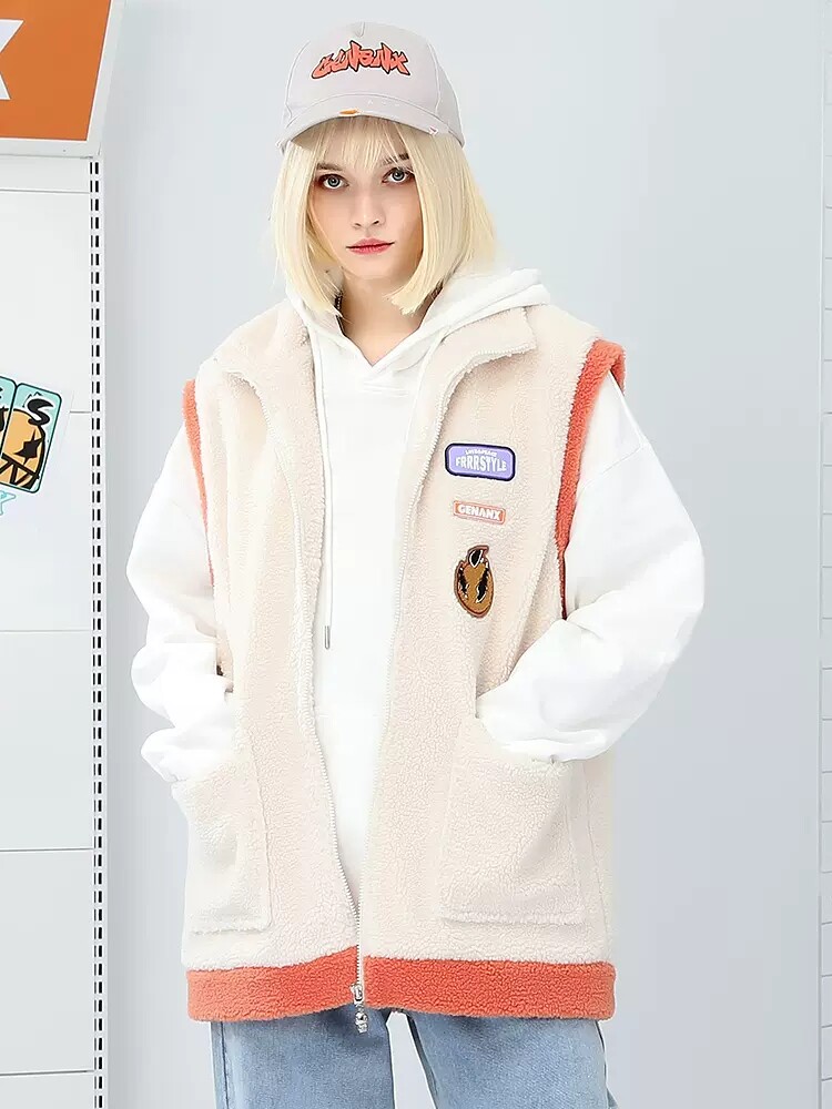 GENANX SHERBET VEST IS A LOOSE COUPLE STYLE CONTRASTING STITCHING AND EMBROIDERED LABEL SLEEVELESS JACKET