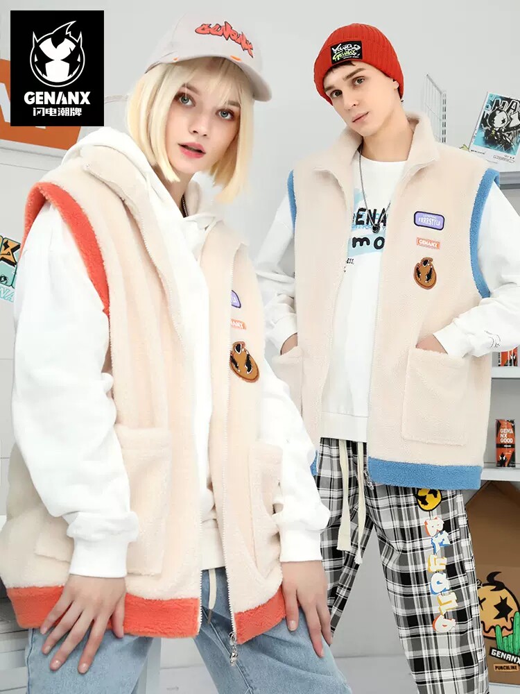 GENANX SHERBET VEST IS A LOOSE COUPLE STYLE CONTRASTING STITCHING AND EMBROIDERED LABEL SLEEVELESS JACKET