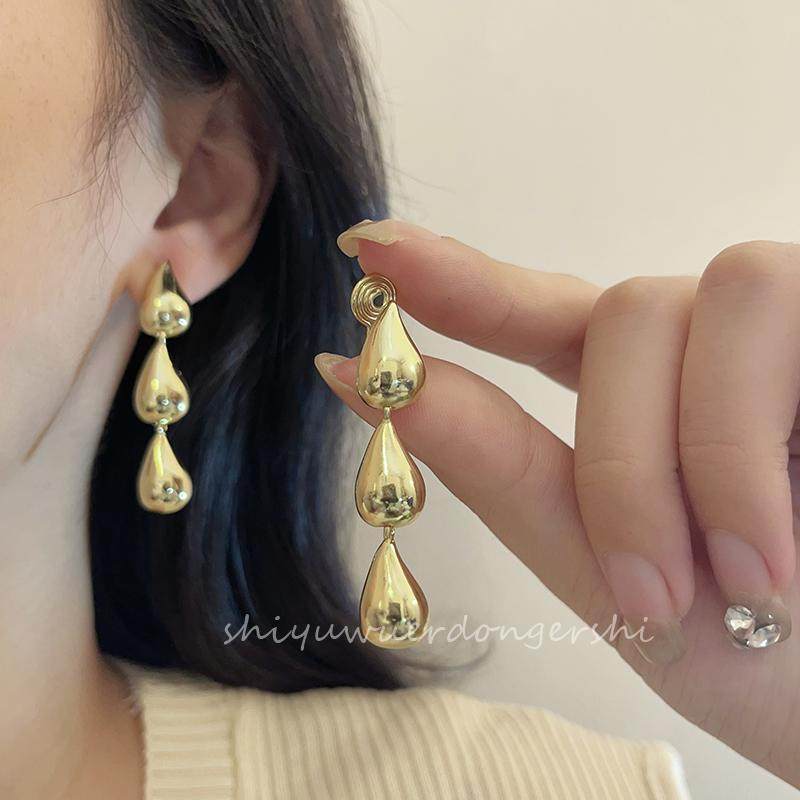 长款显瘦金色水滴耳钉女简约时尚个性小众设计感蚊香盘无耳洞耳夹,饰品/流行首饰/时尚饰品新,耳夹,淘宝优惠券,粉丝福利购,淘宝优惠卷