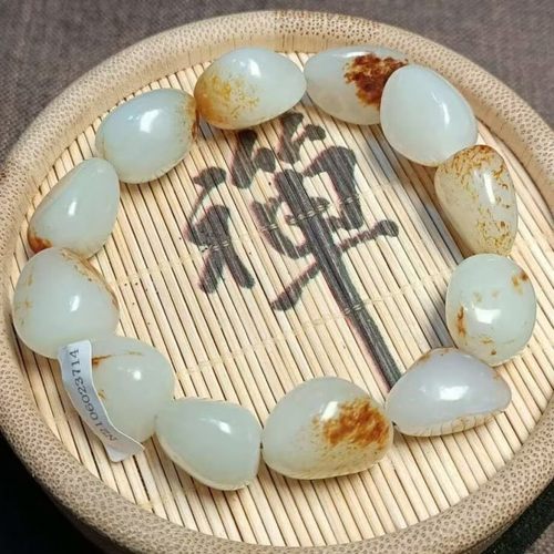 羊脂级籽料原石随形手串