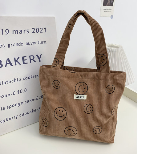 新款笑脸灯芯绒小号手提杂物包