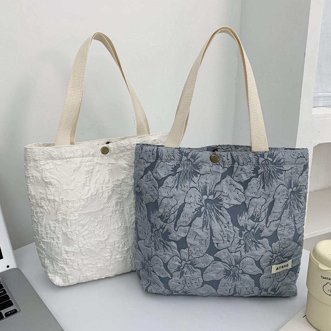 韩版ins2026春夏新款浮雕花朵帆布包女休闲百搭手提包时尚水桶包