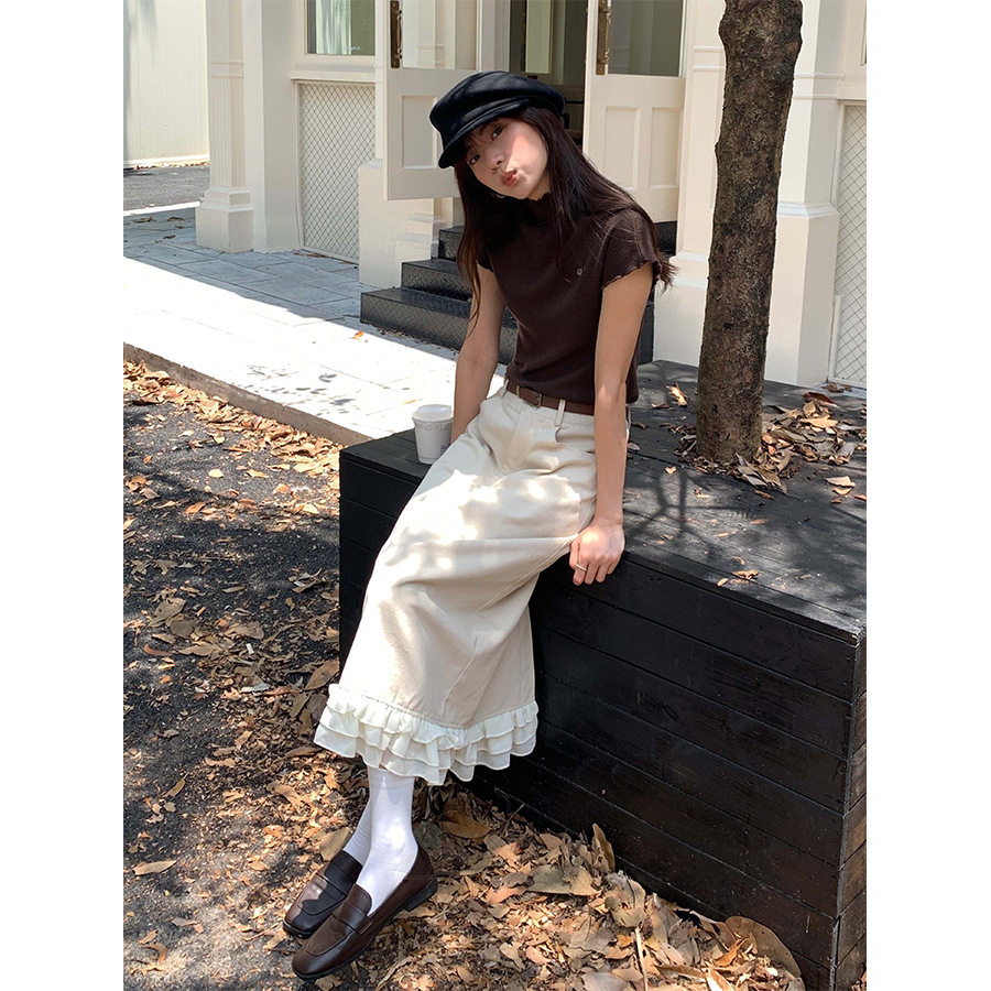 黄峥设计感拼接荷叶边半身裙女2024早秋显瘦高腰直筒半裙143QY616