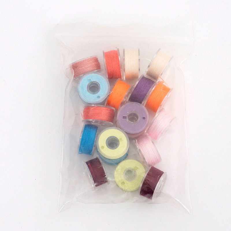 带线梭芯袋装20个塑料家用多功能缝纫机通用梭心10色彩色透明梭芯
