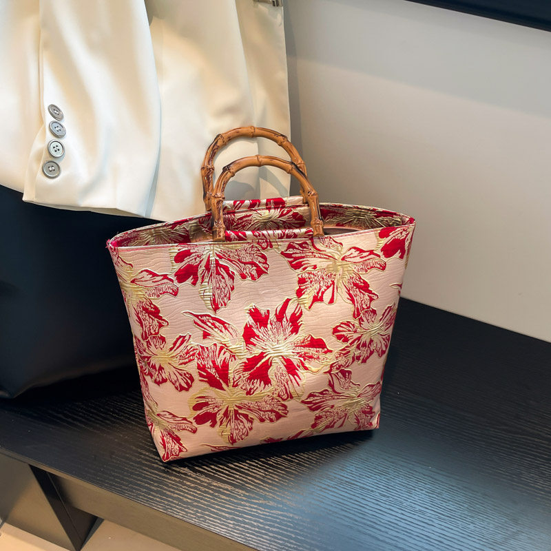 小众设计竹节手提托特包女2025新款夏日旗袍搭配便通勤包旅游大包