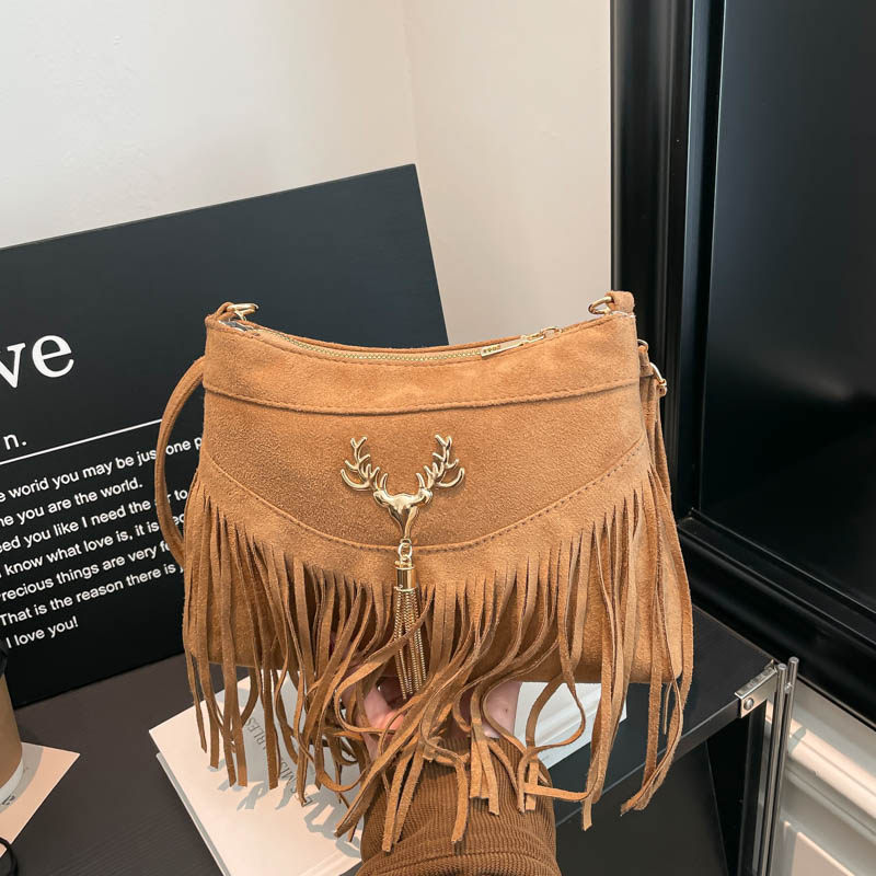 小众设计包包女早春2026新款时尚磨砂单肩斜挎包高级感流苏水桶包,箱包皮具/热销女包/男包,水桶包,淘宝优惠券,粉丝福利购,淘宝优惠卷