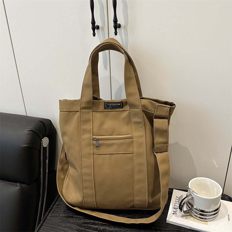 学生电脑简约手提单肩斜挎书包