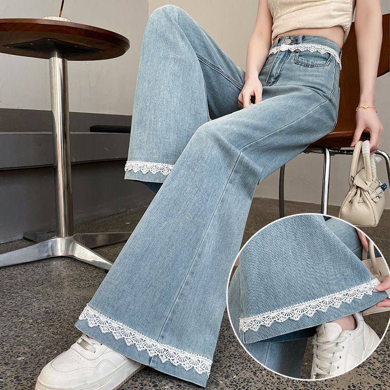 蕾丝花边拼接微喇叭牛仔裤女2025早秋装设计感浅蓝阔腿马蹄长裤子