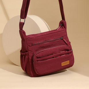 罗博兔单肩包包女2025新款大容量多层斜挎包通勤中年妈妈包尼龙布