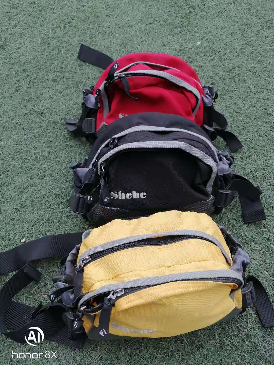 极星全防水旅行家户外休闲旅游登山可调黑色红色大腰包男女登山包