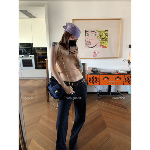 殷三吉腰头重工铆钉牛仔裤