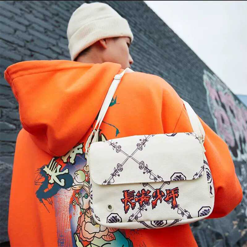 李宁反伍系列情侣新款长安少年男女单肩包运动休闲斜挎包ABDR556