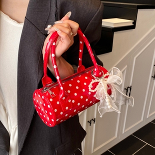 今年流行红色波点包包女2026新款潮时尚小众斜挎包爆款手提圆筒包