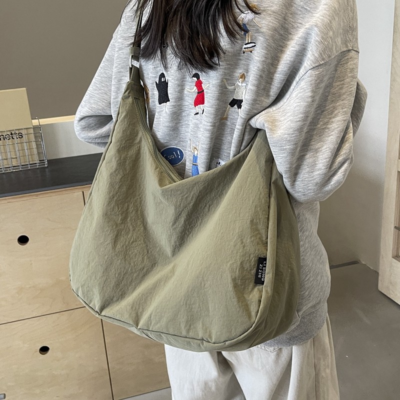 休闲大容量帆布包包女2026新款韩版简约单肩包学生通勤斜挎托特包