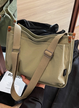 简约大容量帆布包包女2026新款夏天休闲单肩包学生通勤斜挎邮差包