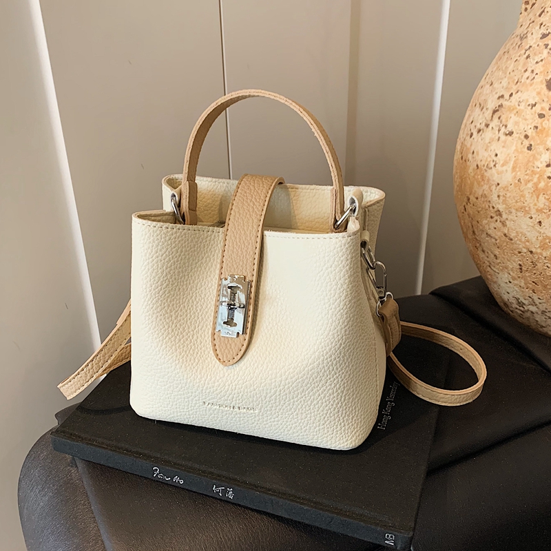 时尚撞色手提水桶包百搭斜挎包