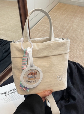 韩系休闲帆布小包包女2026新款夏天轻便斜挎包文艺小众手提水桶包