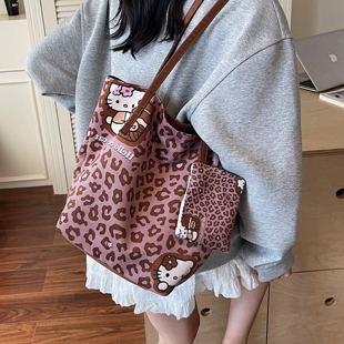 卡通豹纹帆布包包女2026新款休闲大容量托特包学生通勤单肩购物袋