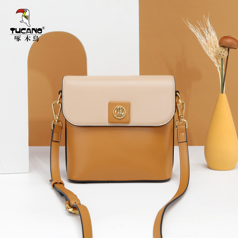 啄木鸟包包女2021新款潮休闲时尚水桶包大容量单肩斜挎秋冬简约包