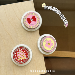 原创水晶钻石磁吸手机支架 快乐转圈圈创意草莓气囊款