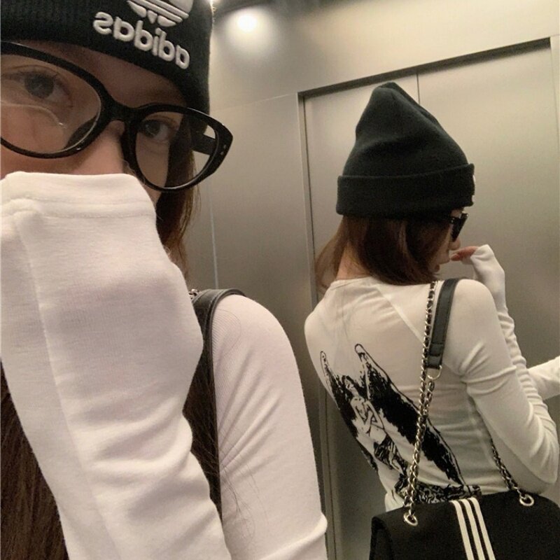 辣妹性感露背长袖T恤女2026春秋季新款设计感修身显瘦内搭上衣