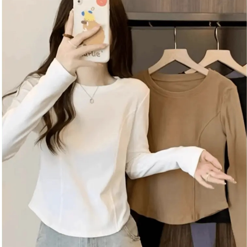白色弧形下摆不规则长袖t恤女2026秋季设计感鱼骨收腰打底衫上衣