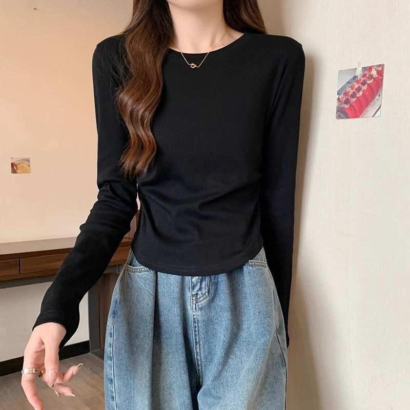 秋冬2026新款长袖T恤打底衫女设计感内搭修身弧形下摆不规则上衣