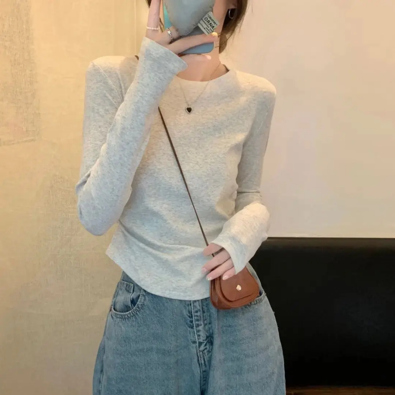 纯色打底长袖T恤女装2026秋冬修身新款弧形下摆收腰褶皱绝美上衣