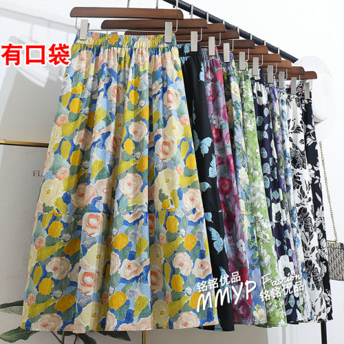 油画风印花A字大摆半身裙夏季2026新款中长款裙子显瘦花裙伞裙夏