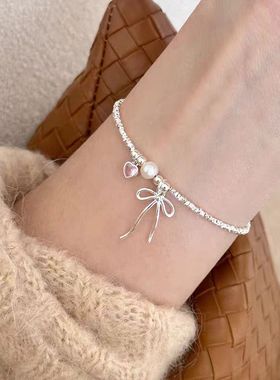 粉色爱心蝴蝶结珍珠碎银子手链