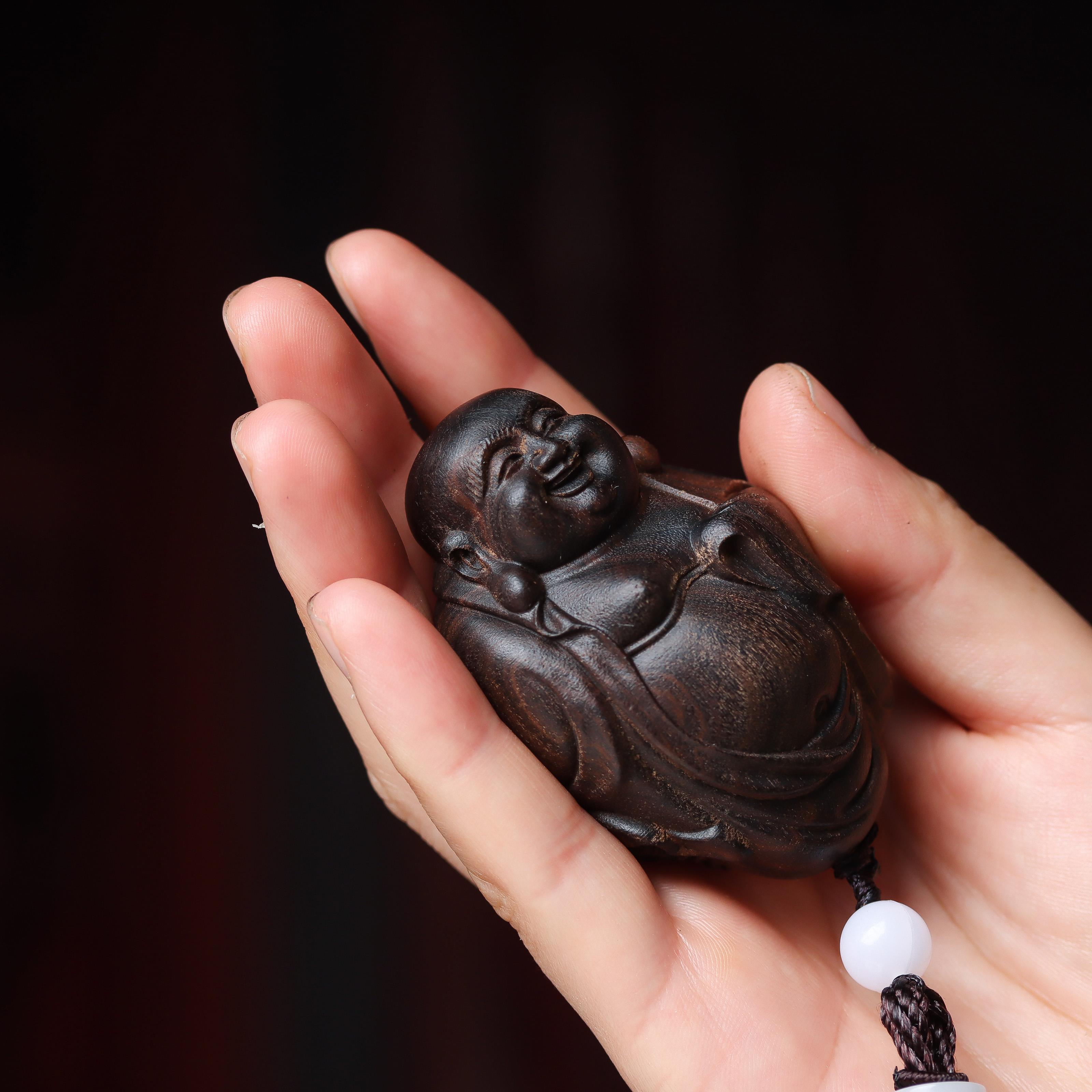 沉香木笑脸弥勒佛手把件