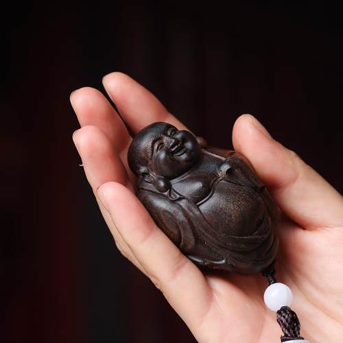 沉香木笑脸弥勒佛手把件