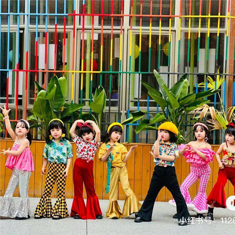 影楼新款潮童复古港风80年代喇叭裤女孩走秀场节目表演出写真服装
