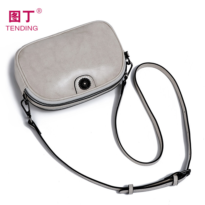 小包包女2021秋冬新款潮白色真皮女包百搭爆款宽带单肩斜挎贝壳包