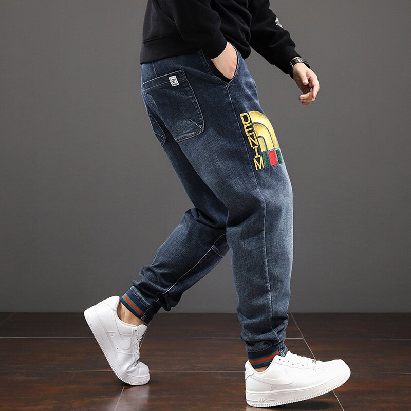 加肥加大码男秋季弹力小脚牛仔裤胖子宽松百搭长裤裤松紧腰潮流