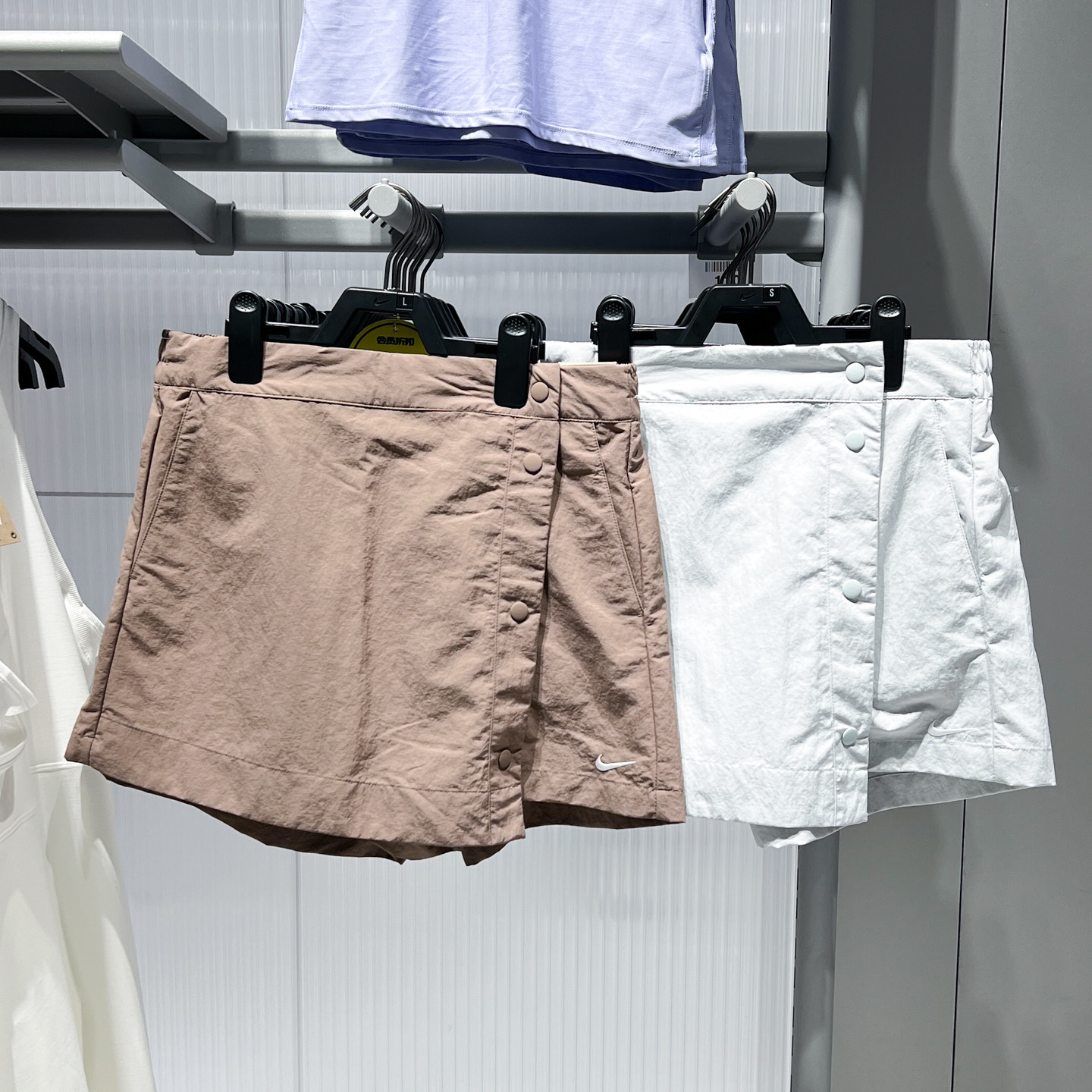 耐克2025夏季新款裙裤女子运动休闲梭织刺绣勾五分短裤HM6980-214