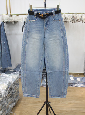 艾拿A88990蓝色水洗宽松牛仔弯刀裤2026年春季新款女装窄版阔腿裤