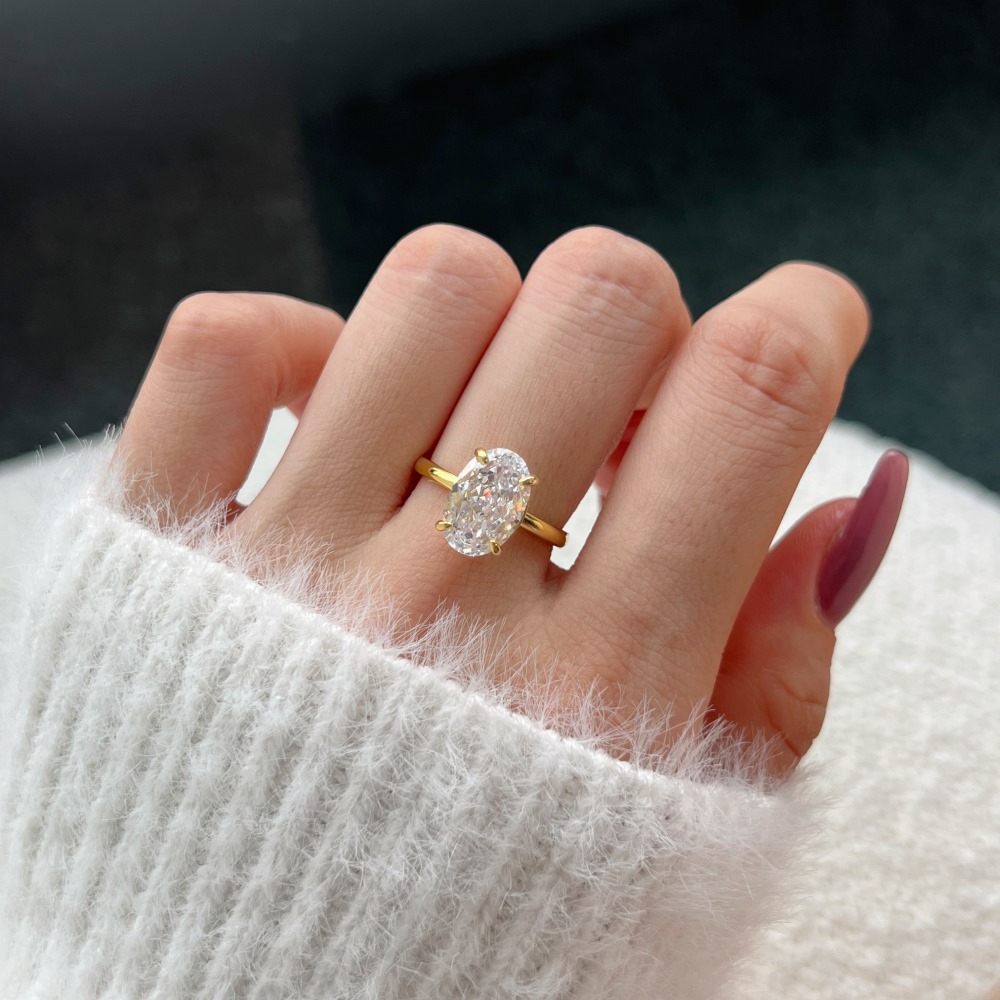 wh法式简约5克拉椭圆形四爪鸽子蛋钻戒订婚求婚礼仿真钻戒指纯银