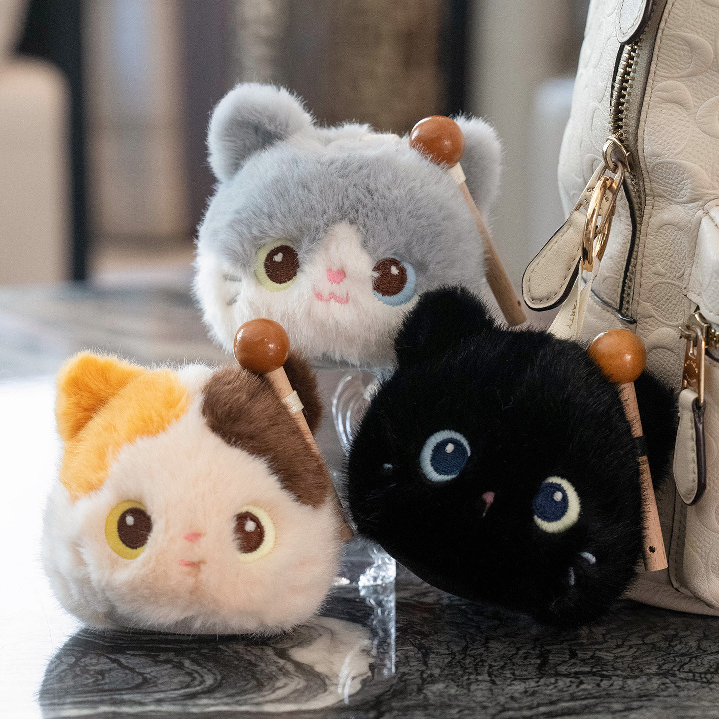 可爱猫咪钥匙扣挂件木鱼敲敲黑猫图片