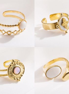 跨境新款轻奢简约钛钢镀18K金镶水滴圆天然石白母贝十字开口戒指