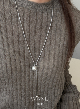 挽里2026新施家白珍珠Y字抽拉虎眼石高级感轻奢小众毛衣链配饰女