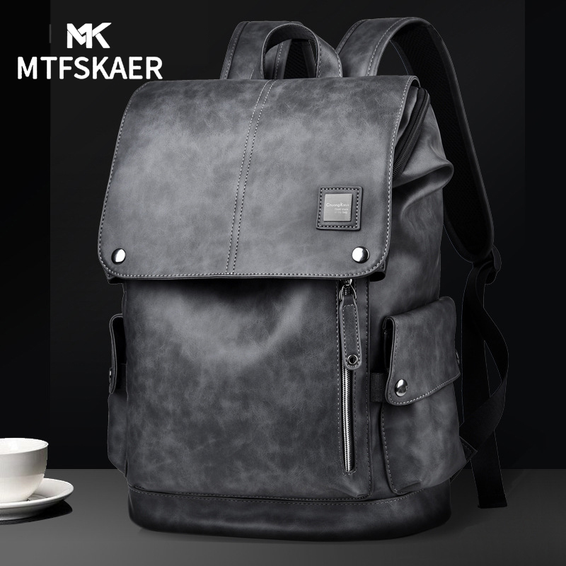 香港MTFSKAER油蜡皮双肩包男真皮