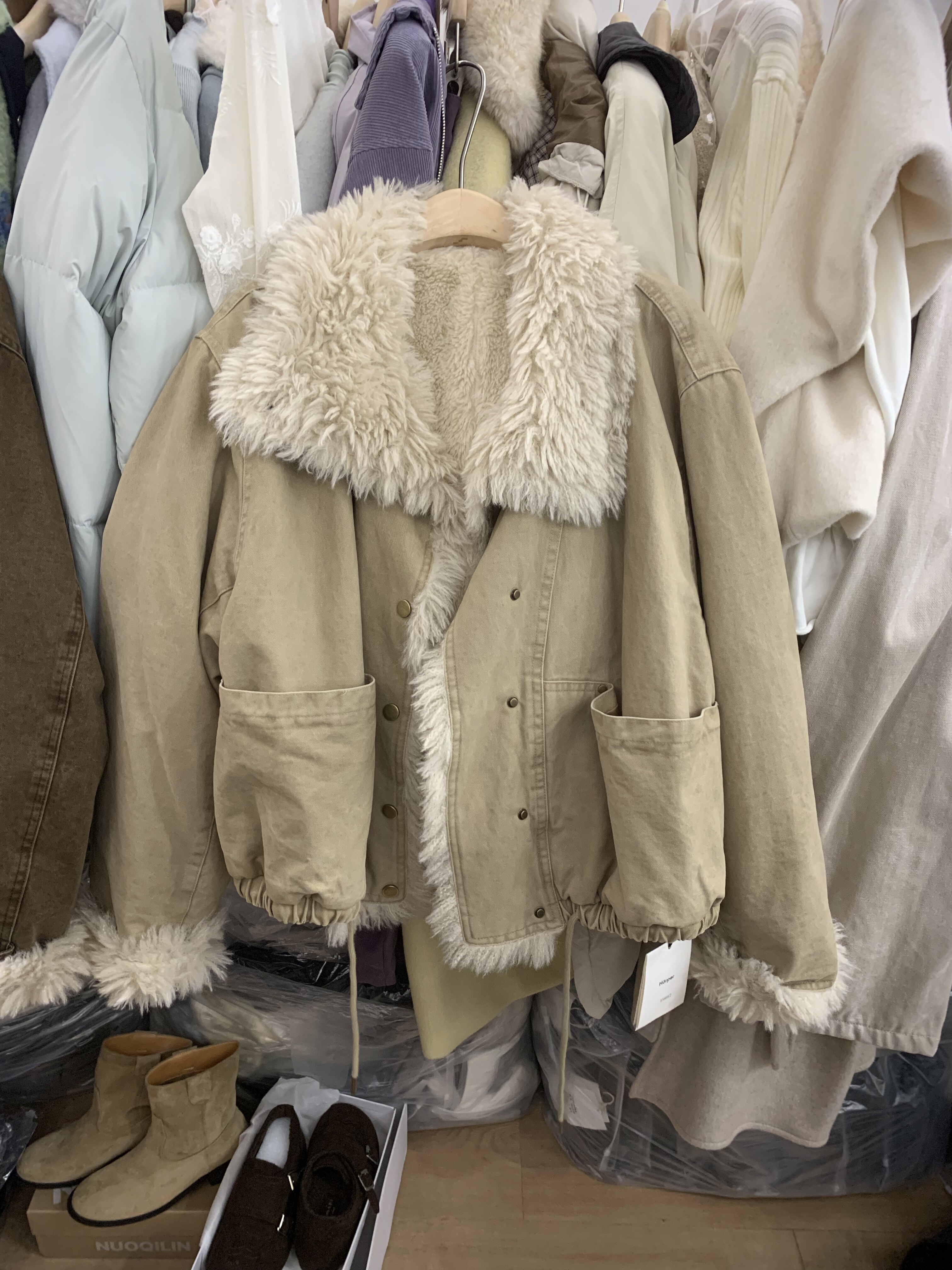 2025冬季新款女装韩版时尚翻领长袖皮毛一体宽松休闲百搭上衣