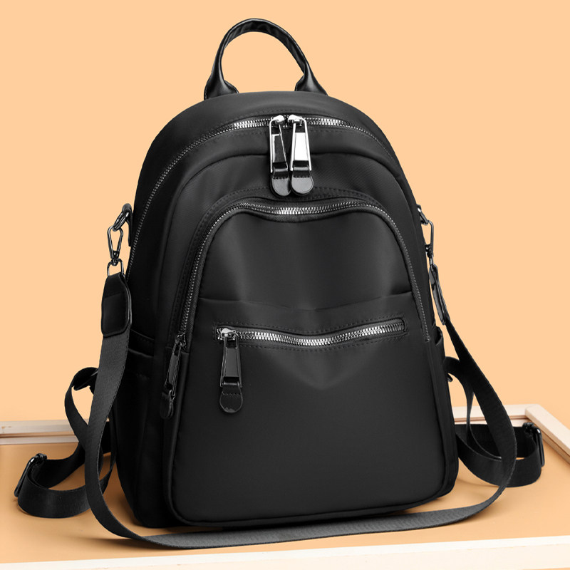 休闲简约风牛津布双肩包女大容量多口袋户外旅行书包黑色通勤背包