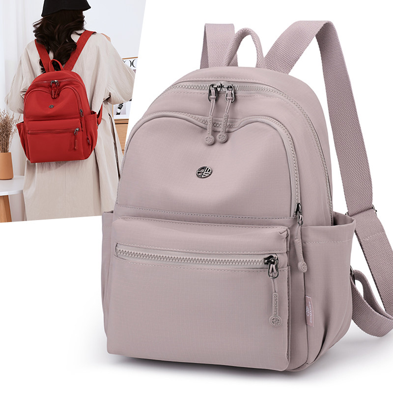 休闲风双肩包女2026新款大容量轻便防水通勤旅行简约背包学生书包